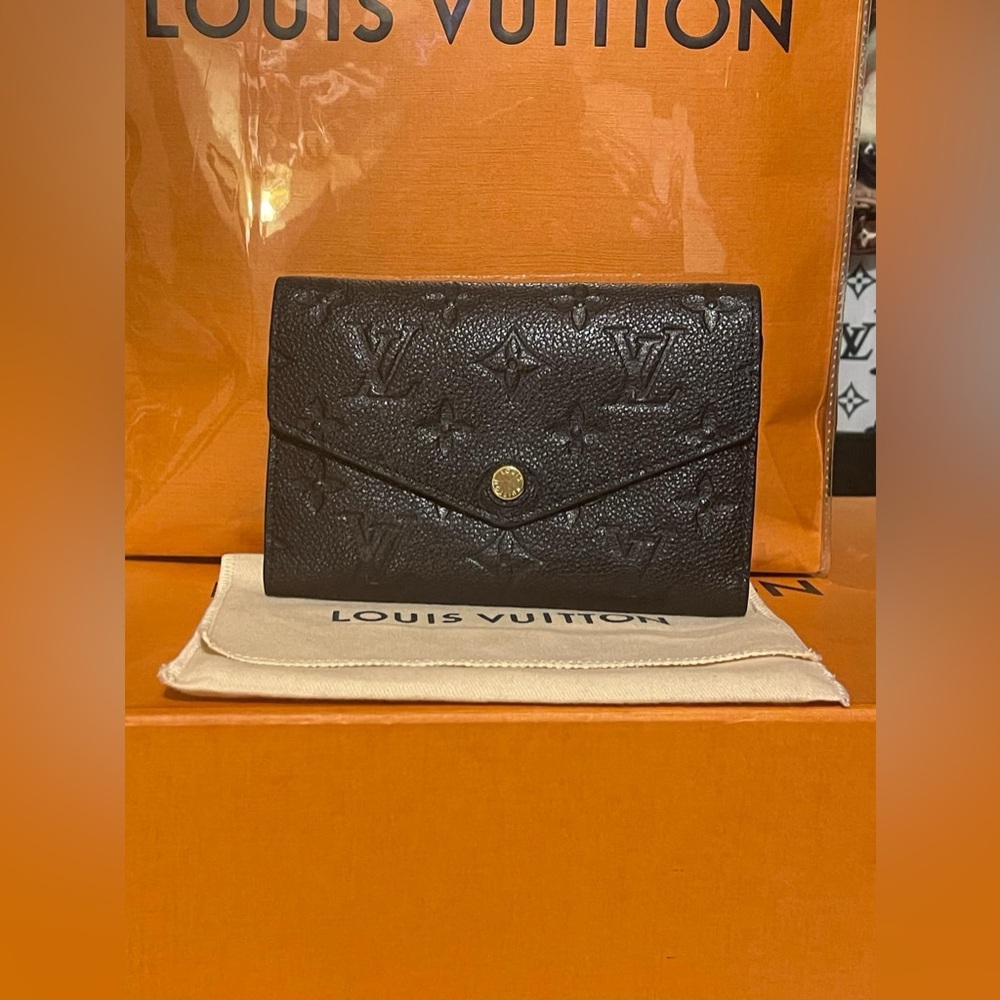 Louis Vuitton compact Curieuse wallet